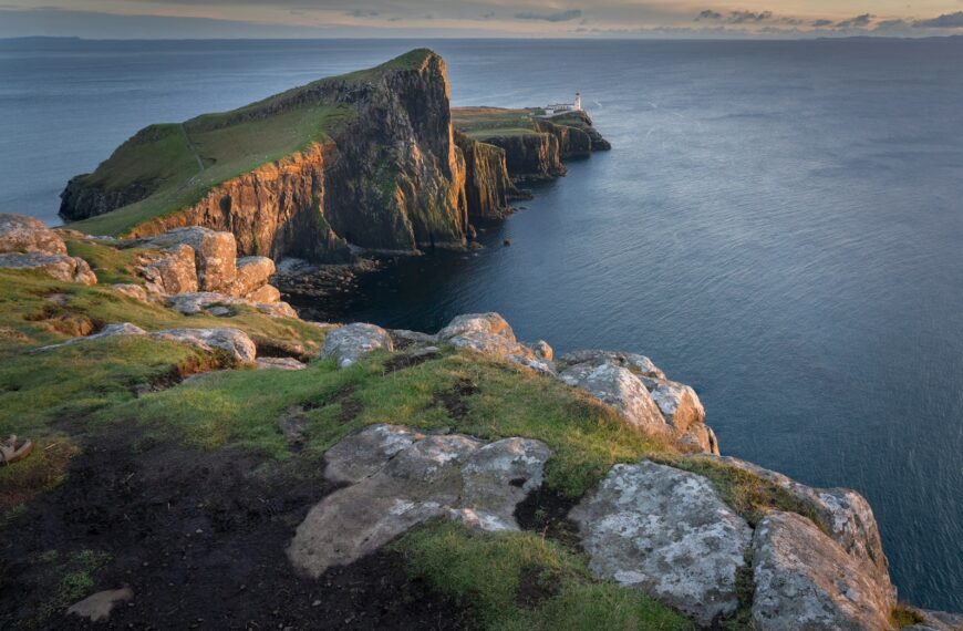 A large body of water surrounded by rocks